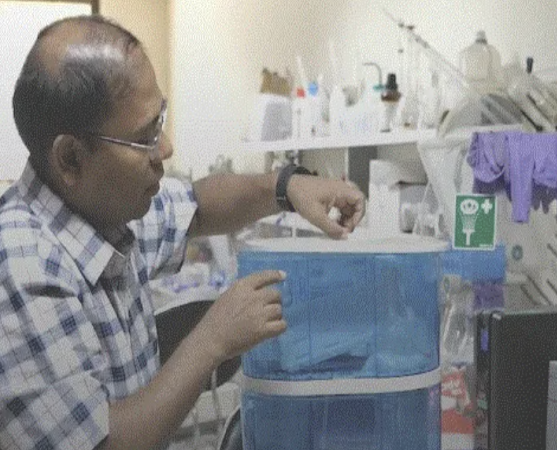 Low-cost water treatment system to remove fluoride, iron